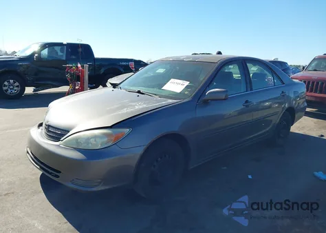 2003 Toyota Camry Le z USA, uszkodzony, nr VIN 4T1BE32K63U701774